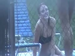 The attractive daughter of the neighbor is seen on video in her swimming pool.